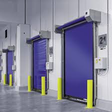 Roll-up door installed in a warehouse setting