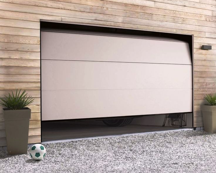 Close-up of the track and motor on the sectional door